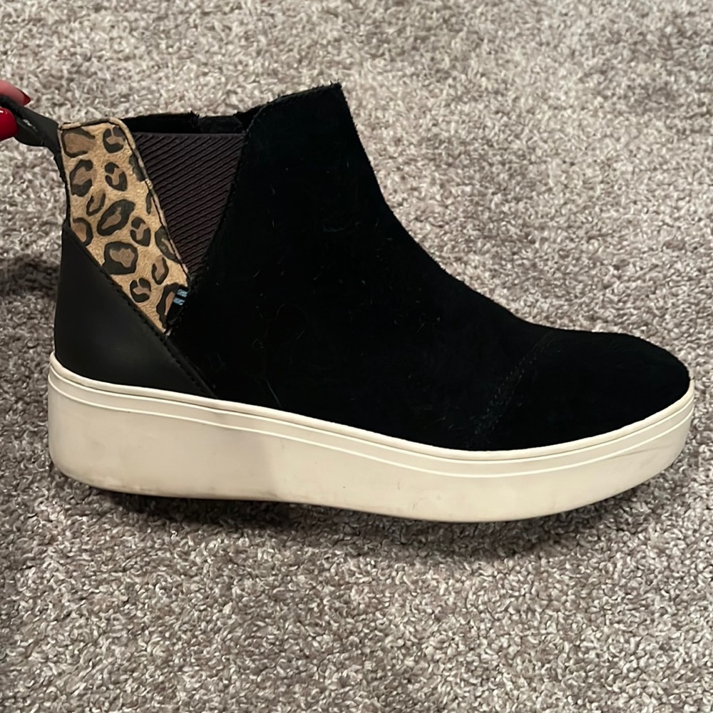TOM shoes with cheetah print. There is scuffing on the backs as seen in picture.